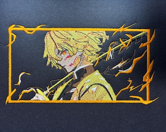May include: Embroidered design of an anime character with yellow hair and orange eyes, holding a sword. The design is framed in a gold border with lightning bolt accents, set against a black background.