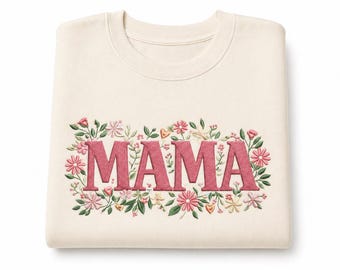 May include: Cream-colored sweatshirt with the word "MAMA" embroidered in a bold, pink font. The letters are surrounded by a floral design with pink, green, and cream-colored flowers and leaves. The sweatshirt is folded neatly.