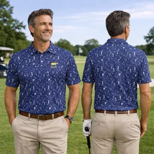 May include: Navy blue polo shirt with a white golf-themed pattern and the Masters logo. The shirt is paired with khaki pants and a brown belt. The image shows the front and back of the shirt.