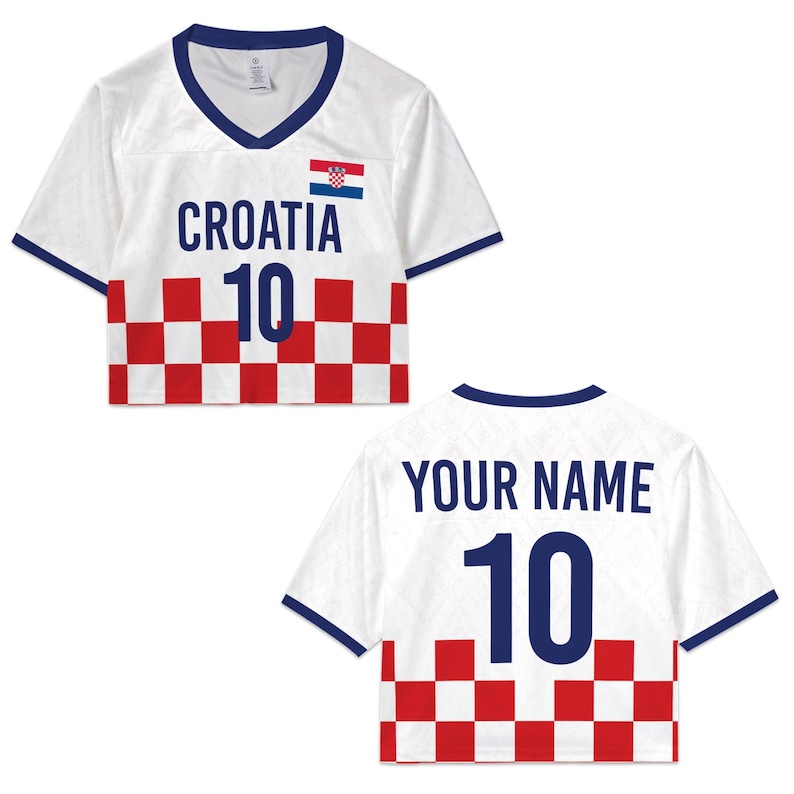 May include: White crop top jersey with blue trim and a V-neck. The front features the word "CROATIA", the number "10", and the Croatian flag. The bottom has a red and white checkered pattern. The back says "YOUR NAME" and the number "10".