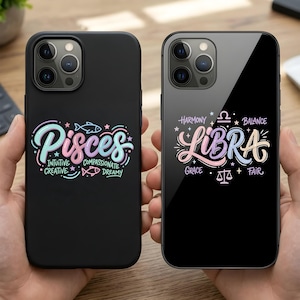 May include: Two black phone cases, one featuring the word "Pisces" in a colorful script with the words "Intuitive, Creative, Compassionate, Dreamy." The other case displays "Libra" with "Harmony, Balance, Grace, Fair."