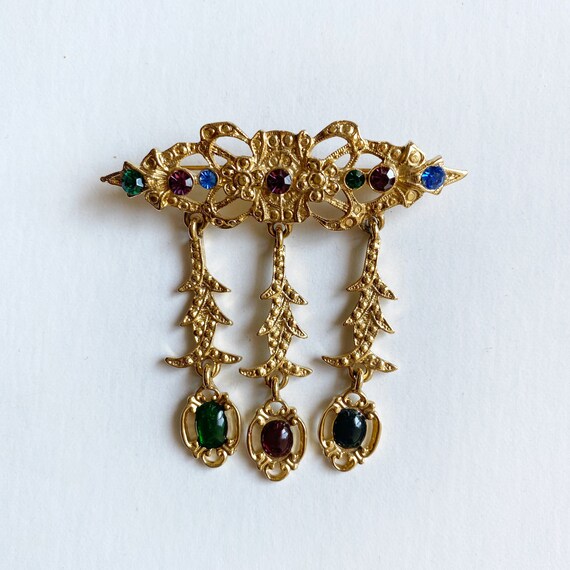 1980s Gold Tone Jeweled Brooch Dangle Pendants Wo… - image 1