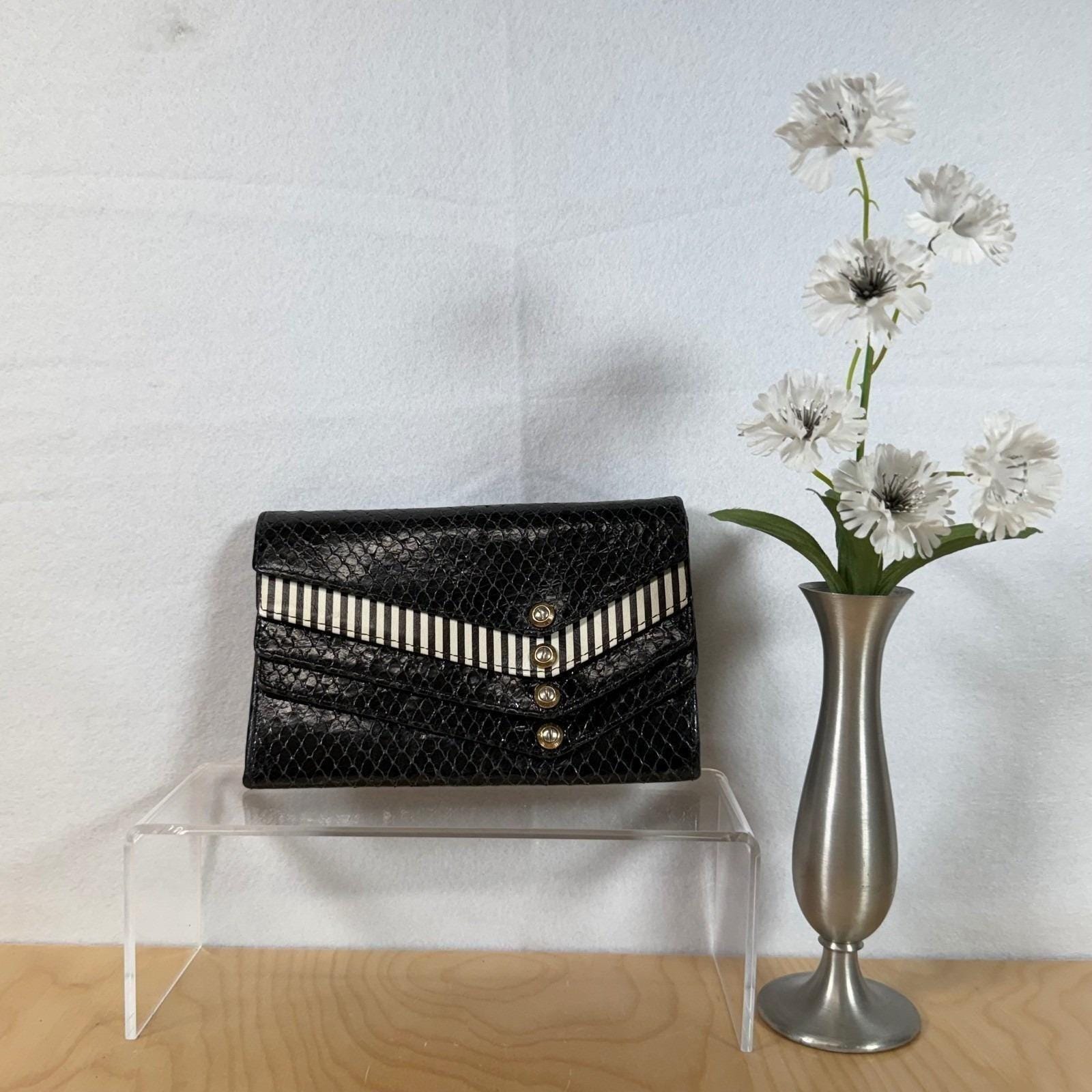 Henri bendel クラッチ財布 s-l1200.jpg