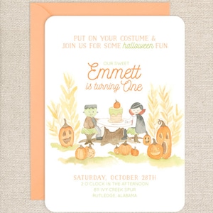 May include: Halloween-themed birthday invitation with a watercolor illustration of a pumpkin, a monster, and a vampire. The text reads "Put on your costume & join us for some Halloween fun. Our sweet Emmett is turning one. Saturday, October 28th, 2 o'clock in the afternoon, 811 Ivy Creek Spur, Rutledge, Alabama."