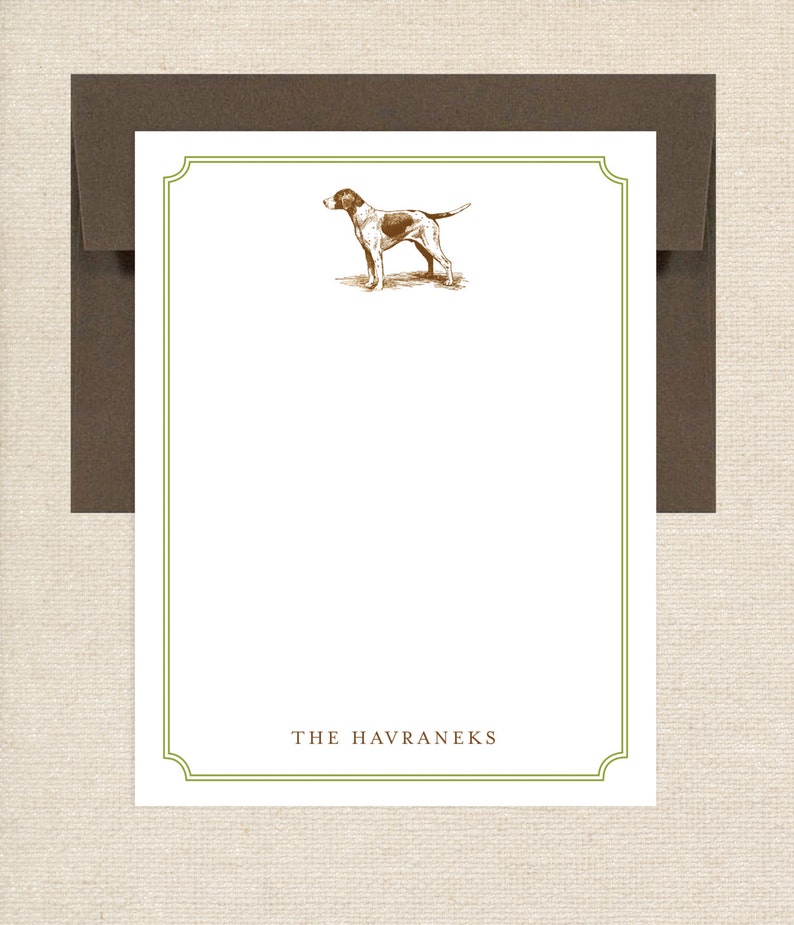 May include: A white stationery card with a green border and a brown illustration of a dog. The text "THE HAVRANEKS" is printed in brown at the bottom of the card.