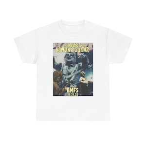 May include: White t-shirt featuring a graphic design with the text "THE NIGHT OF THE HOWLING GUITAR" and "BMFS 10.31.25". The design includes images of musicians playing guitars.