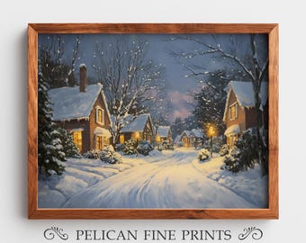 May include: A framed winter landscape painting depicts a snow-covered village street at dusk. The houses have snow-covered roofs and lit windows. The artwork is in a brown wooden frame. The text "PELICAN FINE PRINTS" is at the bottom.