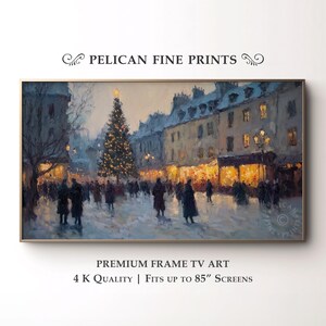 May include: A framed print of a winter scene with a Christmas tree in the center of a town square. The painting has a soft, muted color palette with warm yellow lights and silhouetted figures. Text at the top reads "PELICAN FINE PRINTS". The bottom text reads "PREMIUM FRAME TV ART" and "4 K QUALITY | FITS UP TO 85" SCREENS".