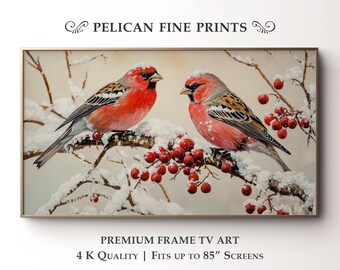 May include: A framed print featuring two red and gray birds perched on a snow-covered branch with red berries. The artwork is labeled "PELICAN FINE PRINTS" and "PREMIUM FRAME TV ART". The print is 4K quality and fits up to 85" screens.