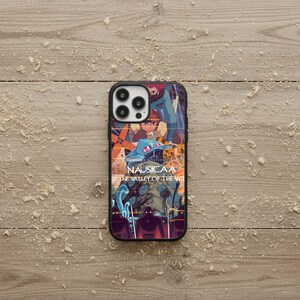 May include: Black phone case featuring a colorful anime-style graphic with the text "NAUSICA&Auml; OF THE VALLEY OF THE WIND." The design includes a character in a blue outfit and a blue aircraft. The case is on a wooden surface.