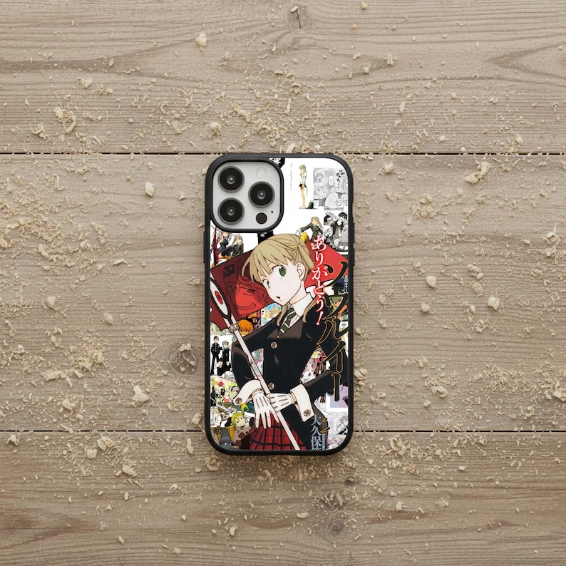 May include: Black phone case featuring a colorful anime-style collage. The design includes a central image of a character in a black uniform holding a flag, surrounded by other manga panels and Japanese text.