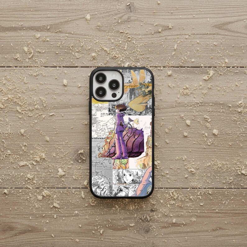 May include: Black iPhone case with a collage design featuring anime-style illustrations in shades of purple, yellow, and white. The case has a black border and a glossy finish, showcasing a unique artistic aesthetic.