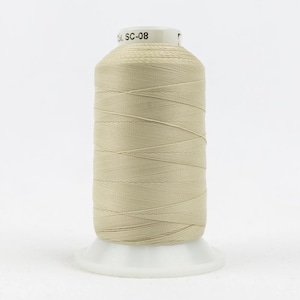 May include: A spool of light beige sewing thread wound onto a white plastic cone. The top of the spool features a white label with the black printed text Col. SC-08. The thread is tightly coiled in a smooth, uniform pattern around the central core.