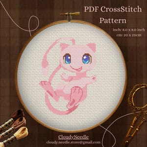 May include: A cross-stitch pattern featuring a pink cartoon character with blue eyes, displayed in an embroidery hoop. The pattern is 8.0 x 8.0 inches (20 x 20cm) and is labeled "PDF CrossStitch Pattern". The seller's email is also included.
