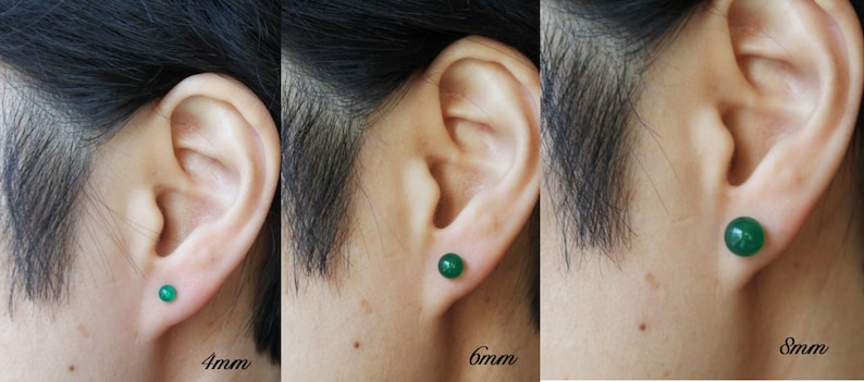 May include: Three close-up images of a person's ear with a green gemstone earring. The earrings are shown in three sizes: 4mm, 6mm, and 8mm.