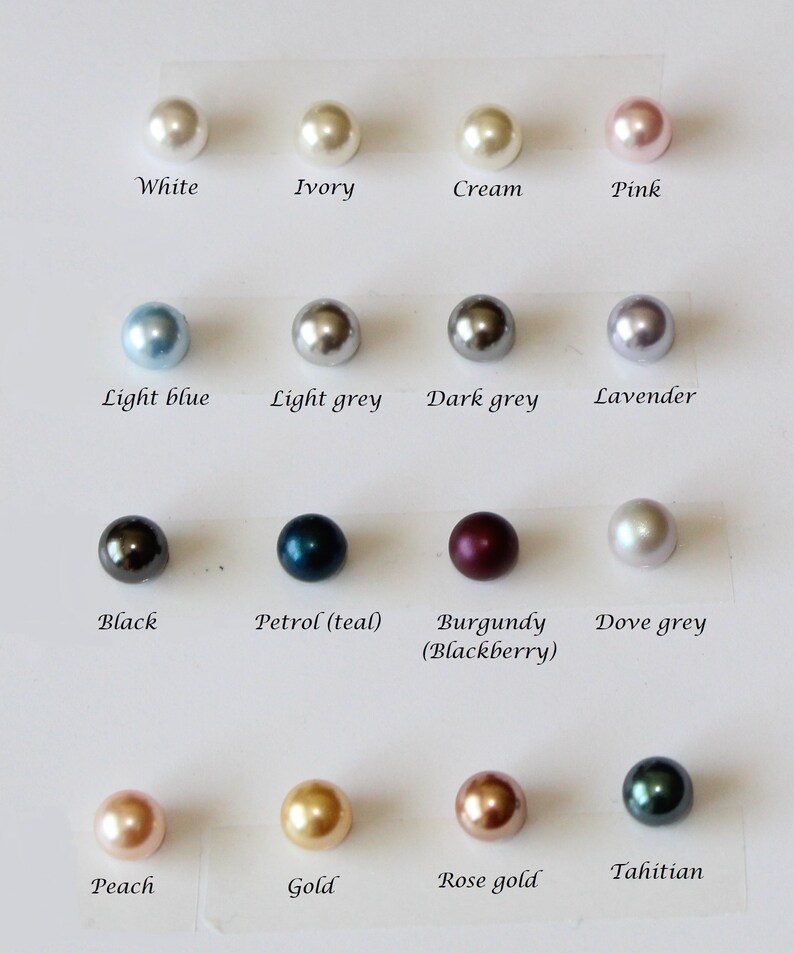 May include: A chart showing 16 different colors of pearls. The pearls are arranged in four rows of four. The colors are: white, ivory, cream, pink, light blue, light grey, dark grey, lavender, black, petrol (teal), burgundy (blackberry), dove grey, peach, gold, rose gold, and Tahitian.