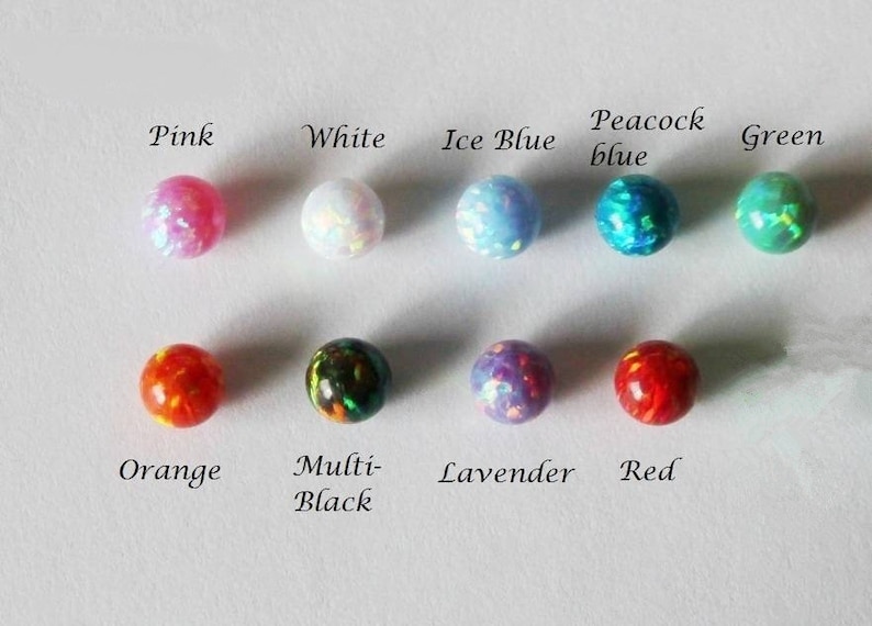 May include: Assortment of 10 opalite beads in various colors, including pink, white, ice blue, peacock blue, green, orange, multi-black, lavender, and red.