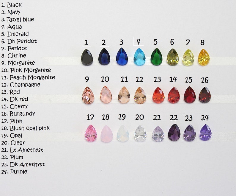 May include: Chart of 24 teardrop-shaped gemstones in various colors, numbered 1 through 24. The colors include black, navy, royal blue, aqua, emerald, peridot, citrine, morganite, pink morganite, peach morganite, champagne, red, dark red, cherry, burgundy, pink, blush opal pink, opal, clear, light amethyst, plum, dark amethyst, and purple.