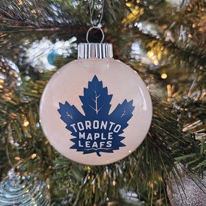 Decorazione natalizia dei Toronto Maple Leafs – Disco bianco glitterato, logo dei Leafs, regalo per i tifosi di hockey