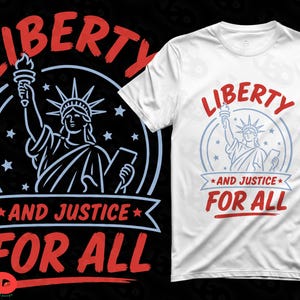 May include: A white short-sleeve t-shirt featuring a graphic of the Statue of Liberty in light blue lines, surrounded by stars. The text LIBERTY is arched above in red, with AND JUSTICE FOR ALL printed in red below the statue on a banner.