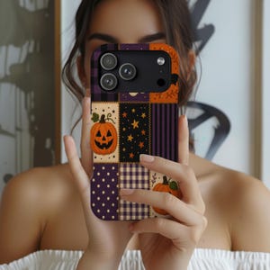 May include: A smartphone case featuring a patchwork design with various Halloween-themed patterns. The print includes orange jack-o'-lanterns, yellow stars on a black background, purple and white polka dots, and black and white gingham checks.
