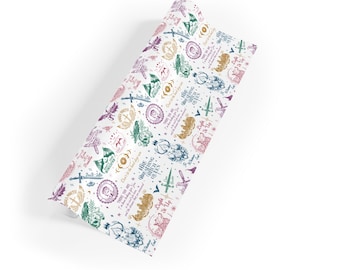 May include: A roll of white wrapping paper with a repeating pattern of whimsical illustrations in various colors. The design includes swords, owls, and text that reads "Fire Breathing Bitch Queen" and "Light It Up".