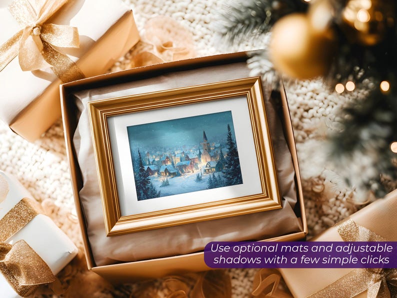 May include: A framed winter landscape painting with a gold frame, presented in a gift box with a gold bow. The painting depicts a snow-covered village with a church steeple. The text in the image reads: "Use optional mats and adjustable shadows with a few simple clicks."