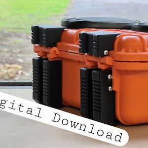 May include: Two orange and black storage cases with black handles and latches. The cases are rectangular and appear durable. The cases are sitting on a light-colored surface. The words "Digital Download" are written across the image.