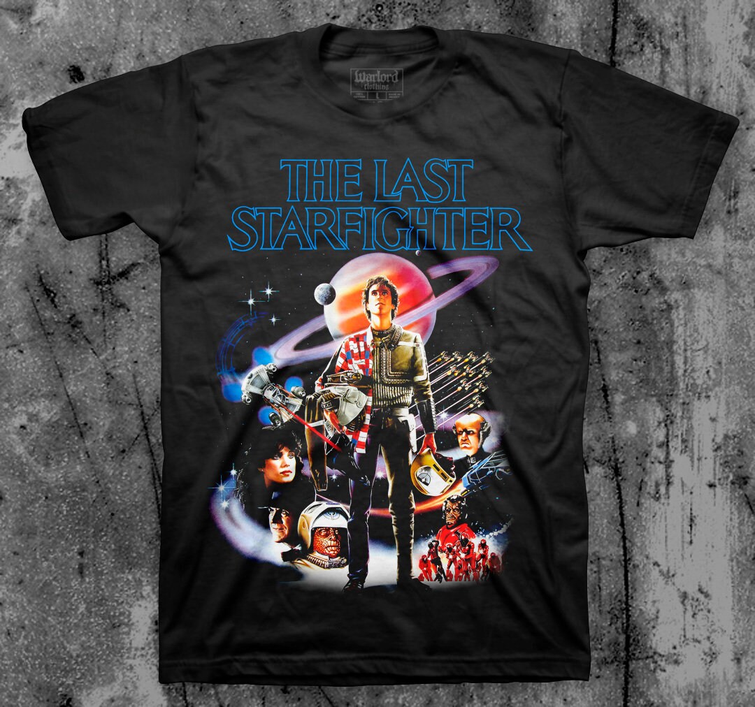 T-shirt Uomo The Last Starfighter Anni 80 Film Retr&ograve; Cotone Maglietta Uomo The Last Starfighter - Film Retr&ograve; Anni '80, T-shirt In Cotone Taglio Largo T -shirt Film Anni 80 Retr&ograve;