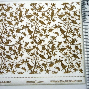 May include: A sheet of white paper with a repeating pattern of brown birds and leaves. The pattern is printed on the paper and is about 3 inches by 4 inches. The text "3X4-P-BIRDS" and "WWW.METALDESIGNZ.COM" is printed at the bottom of the sheet.