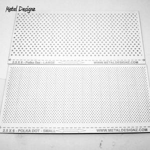 May include: Two rectangular metal sheets with a polka dot pattern. The top sheet has larger dots, labeled "2.5 X 6 - Polka Dot - LARGE." The bottom sheet has smaller dots, labeled "2.5 X 6 - Polka Dot - SMALL." The website address "WWW.METALDESIGNZ.COM" is printed on both sheets.