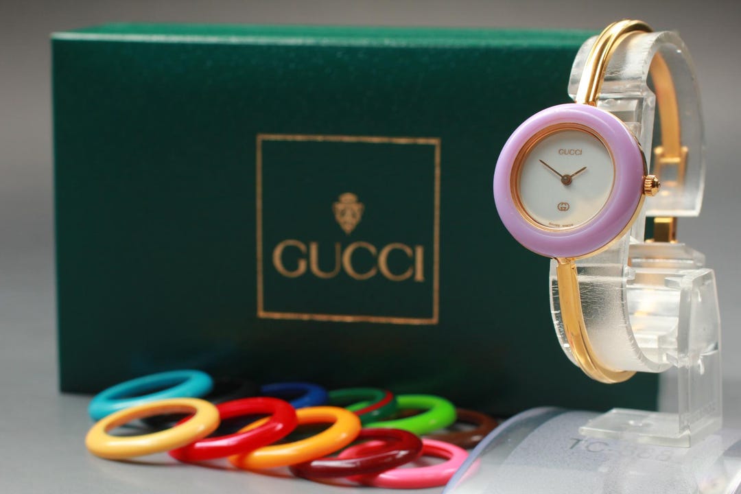 reloj-de-cuarzo-vintage-gucci-11-12-exc-5-para-mujer-con-bisel