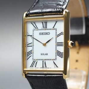 New Batt SEIKO Noie 1E20-3A00 (near Mint) 21mm Dual Time Quartz