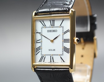Seiko V115-0BC0 SUP880 (Near MINT)  Solar Tank Dress White Dial 28mm quartz Men's watch