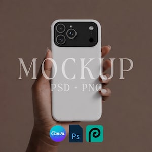 May include: A white phone case with a black camera module is held in a hand. The word "MOCKUP" is displayed in large, light-colored letters. Below the word are the words "PSD + PNG". The Canva, Ps, and P icons are at the bottom.