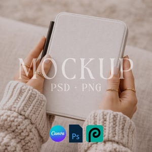 May include: A white tablet case with a black stylus is held by a person wearing a cream-coloured jumper. The word "MOCKUP" is displayed in large, light grey letters, with "PSD + PNG" below. Canva, Photoshop, and Procreate logos are visible.
