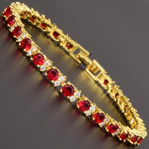 RIZILIA - Birthstone JUL-Red RubyTennis Bracelet & Round Cut CZ in Yellow/White Gold Plated, 7"