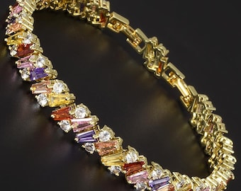 RIZILIA Prism Tennis Bracelet • Tapered Baguette CZ • 14K Yellow Gold • 7 + 1 inch