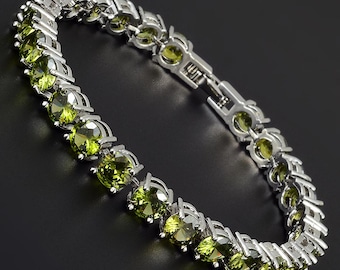 RIZILIA Round Cut Multi-Color CZ 18K Gold Plated Tennis Bracelet, 7"