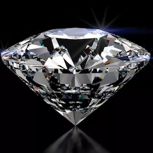 May include: A clear, brilliant-cut diamond with many facets, reflecting light. The gemstone is set against a black background. The diamond's sharp edges and symmetrical shape are prominent, creating a sparkling effect.