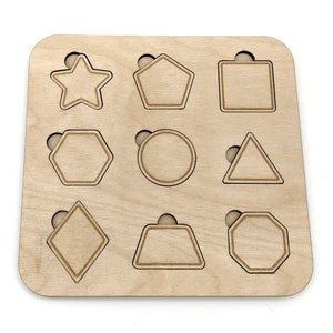 May include: Wooden board with nine cut-out shapes: star, pentagon, square, hexagon, circle, triangle, diamond, trapezoid, octagon.