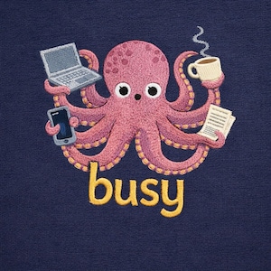 May include: Embroidered design of a pink octopus holding a laptop, smartphone, coffee cup, and papers. The word "busy" is embroidered in yellow below the octopus. The octopus has eight arms and is set against a navy blue background.