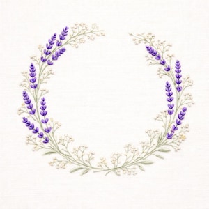 May include: Embroidered wreath featuring lavender sprigs and small white flowers. The wreath is arranged in a circular shape, with the purple lavender and white flowers set against a white background. The design is delicate and floral.
