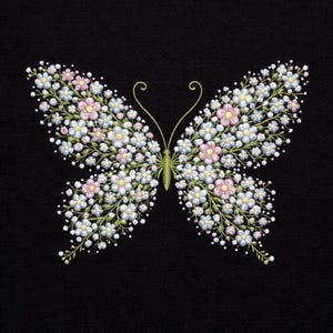 May include: A butterfly design composed of small, embroidered flowers in shades of pink, blue, and white, set against a black background. The butterfly's body and antennae are green, creating a delicate and detailed floral artwork.