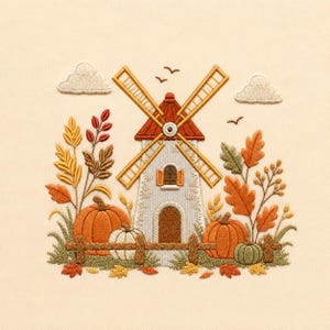Op de afbeelding: Een borduurontwerp met een centrale windmolen met een rood dak en gele wieken, omringd door oranje en witte pompoenen, herfstbladeren, tarwestengels en een houten hek. Twee witte wolken en kleine vogels zijn erboven geborduurd.