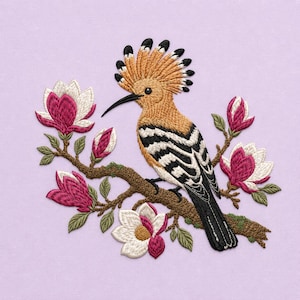 May include: An embroidery design featuring a hoopoe bird with a prominent orange crest and black-tipped feathers, perched on a brown branch. The bird is surrounded by several blooming magnolia flowers with white petals and deep pink centers.