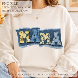 May include: Cream-colored sweatshirt with the word "MAMA" appliquéd in blue and yellow letters on a denim patch. The text "PNG FILE, INSTANT DOWNLOAD, HIGH RESOLUTION" is at the top. The text "BLOOMORA DIGITAL CO | DIGITAL DOWNLOAD ONLY" is at the bottom.