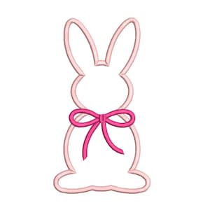 Pode incluir: Um contorno rosa claro de um coelho com orelhas compridas e uma gravata borboleta rosa. O coelho é um design simples, perfeito para artesanato e decorações com tema de Páscoa ou primavera.