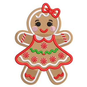 以下が含まれることがあります： 赤いリボン、ドレス、アクセントが付いた女の子の形をしたジンジャーブレッドクッキー。クッキーは白いアウトライン、ピンクの頬、笑顔の顔をしています。ドレスはペパーミントキャンディーと緑の波線で飾られています。