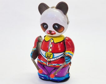 collectible panda bear panda wind up toy early seventies Chinese tin toy Vintage panda tin toy red suit panda toy
